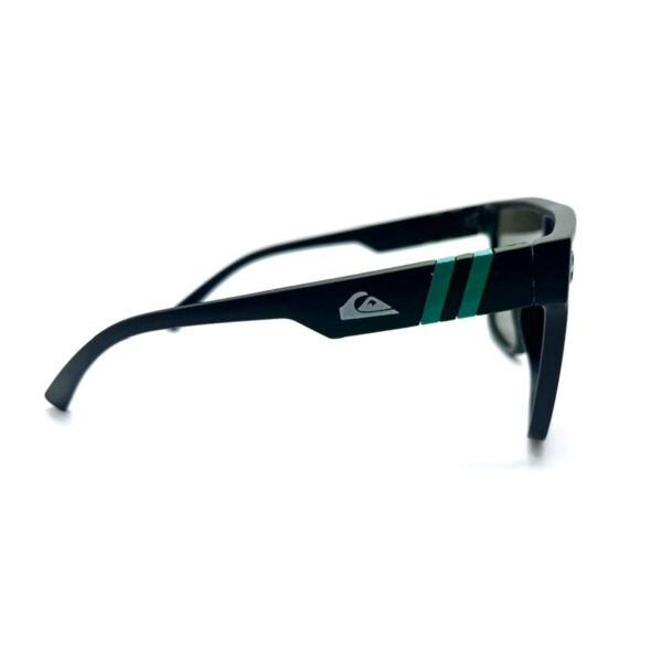 Side view of the Quiksilver 'Visor Shield' sunglasses, highlighting the green stripe detailing on the temple arm and the profile of the blue mirror lens.