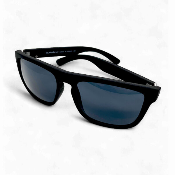 Front view of the Quiksilver QS224 Classic Square sunglasses, clearly showing the high-shine gloss black frame and the dark blue smoke tinted lens.
