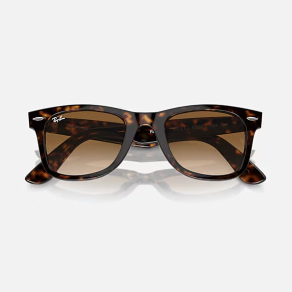 Front view of the Ray-Ban Original Wayfarer Classic RB2140 sunglasses with the temple arms folded in, showcasing the iconic tortoiseshell frame and the brown gradient lenses.