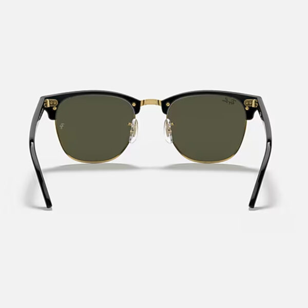 Back view of the Ray-Ban Clubmaster Classic RB3016 sunglasses, showing the inner side of the black browline, gold metal bridge, nose pads, and the G-15 green lenses.