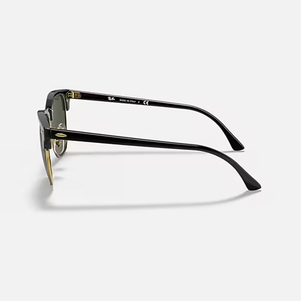 ray-ban-rb3016-clubmaster-black-gold-g15-lens-side-view.jpg Side profile view of the Ray-Ban Clubmaster Classic RB3016 sunglasses, showing the black acetate temple arm and the gold metal hinge detailing.