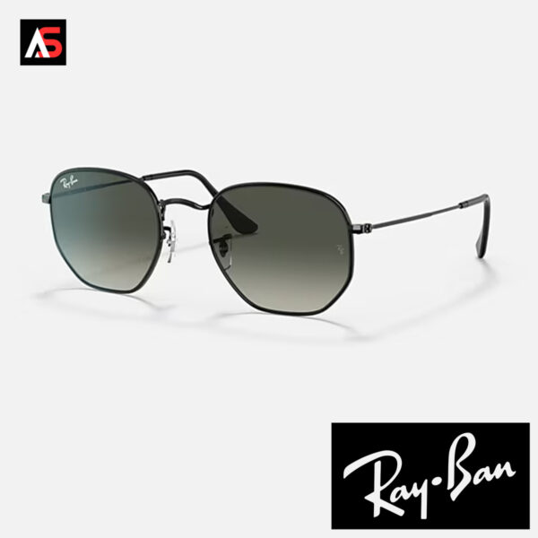 Angled display view of the Ray-Ban Hexagonal Flat Lenses RB3548 sunglasses, showcasing the gunmetal frame, black brow bar, and grey gradient flat lenses, shown on an Accessory Studio display.