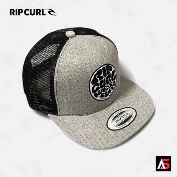 Rip Curl RC108 Wetsuits Patch trucker cap in grey with black mesh, right-angled view highlighting front patch, curved brim, and mesh back.